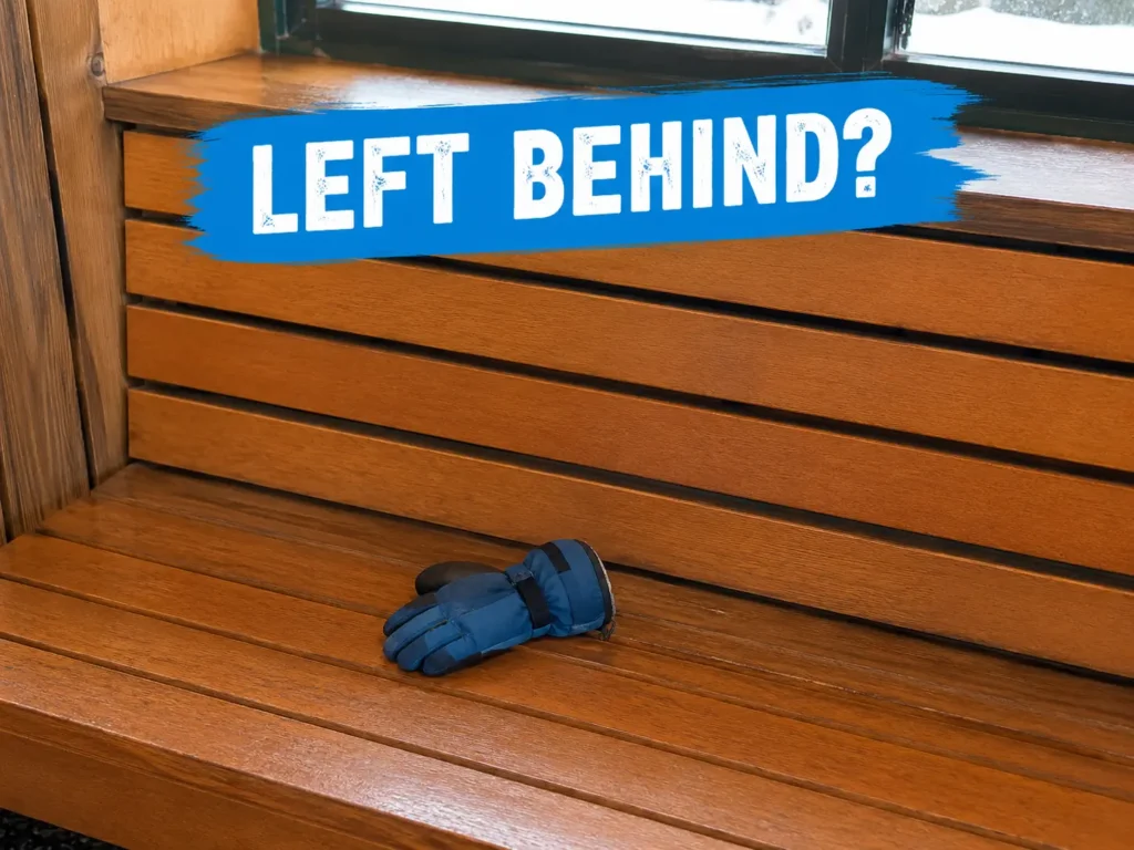 Child's glove left behind on a ski lodge bench