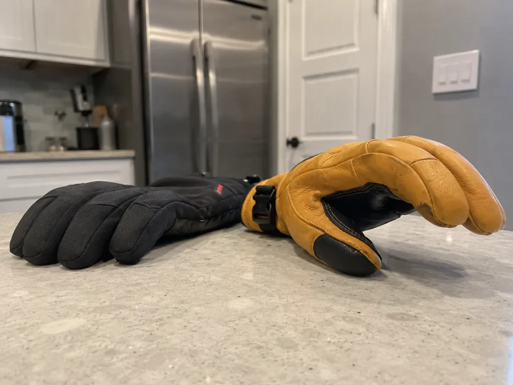 Why pro ski gloves feel better: comparing pre-curved ergonomic construction to flat-cut budget gloves