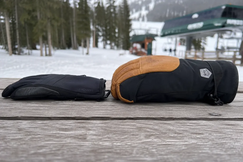 Side profile comparison of heavy and light insulation to show how to stop sweat from ruining ski gloves