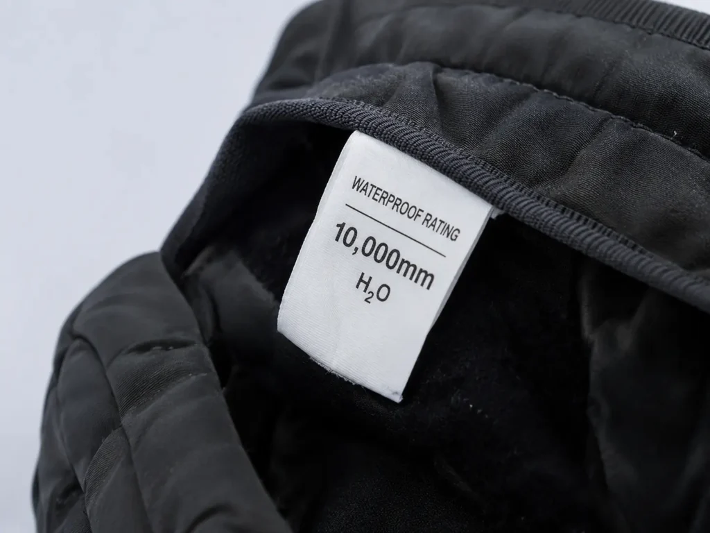 Ski glove waterproof rating tag showing mm rating label close-up
