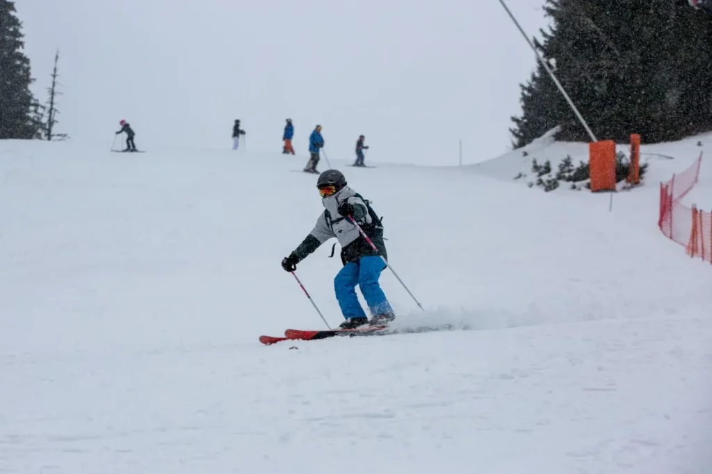 Skier in wet spring slush conditions