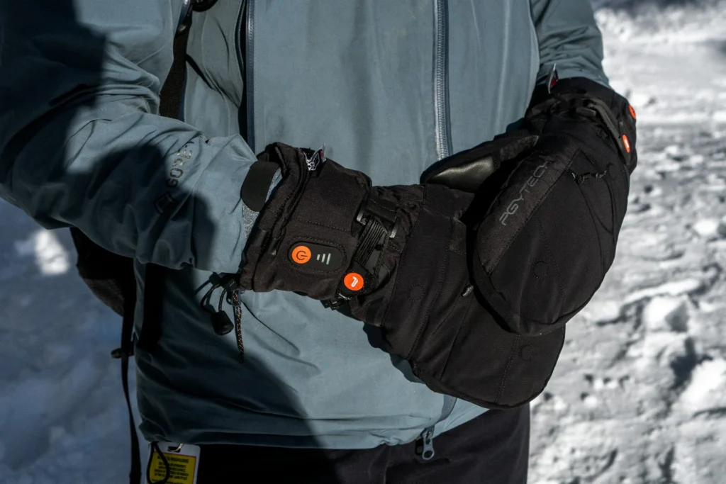 Skier wearing warm mittens in extreme cold